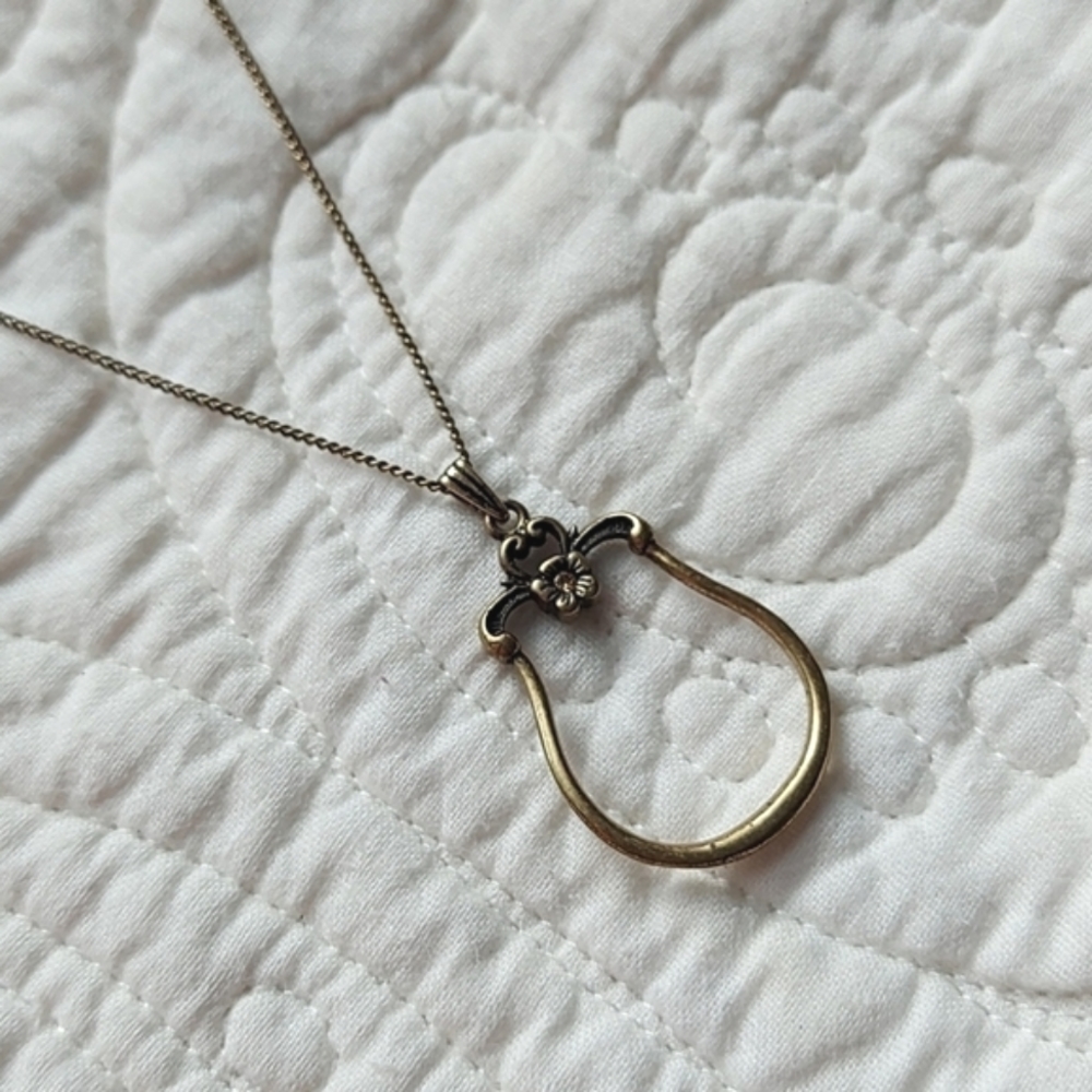 Fossil brass charm necklace